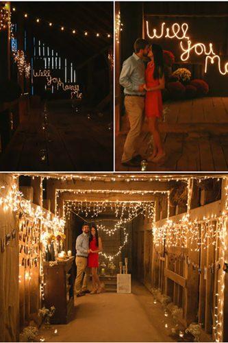 romantic marriage proposal in the barn with candles